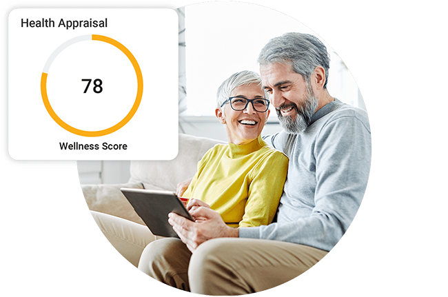 Elderly couple on a tablet showing a dial meter of their health score